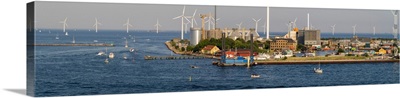 View of city with wind turbines in the sea, Copenhagen, Denmark