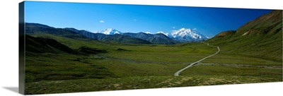 View of road winding through tundra towards Mount McKinley, Denali National Park, Alaska