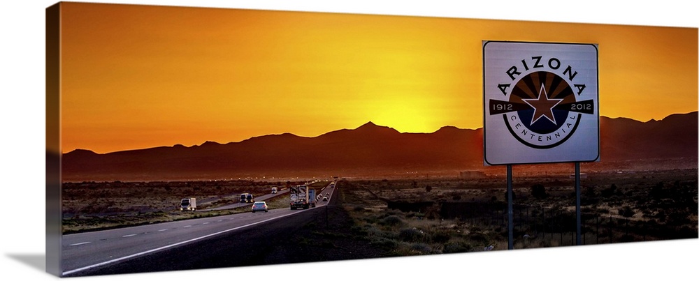 View of signboard at roadside on border at sunset, Arizona, USA.