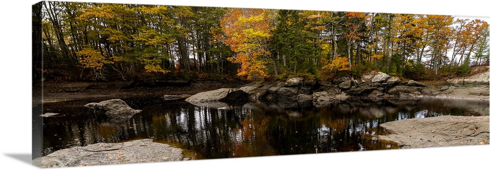 View of stream in fall colors, Maine, USA