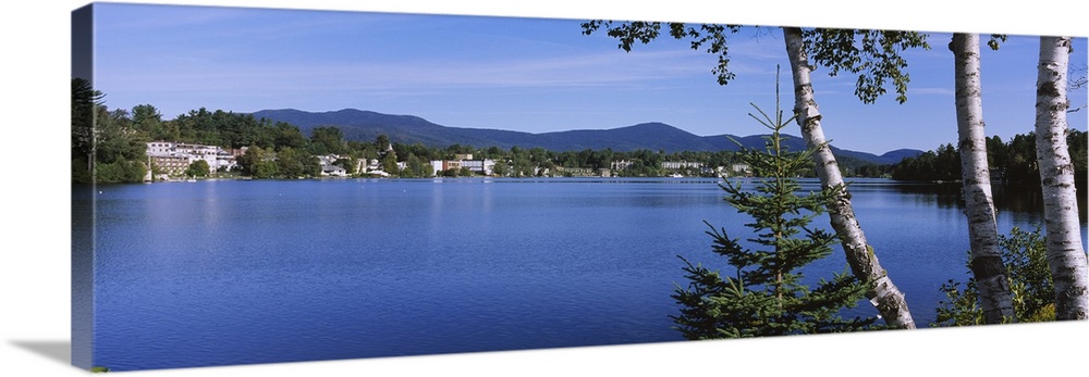 Village at the waterfront with mountains in the background, Lake Placid, Mirror Lake, Adirondack Mountains, New York State