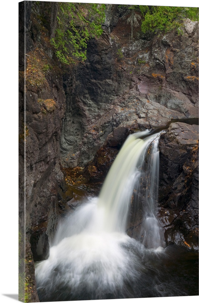 Water cascading over rocky cliff, Cascade River State Park, Minnesota