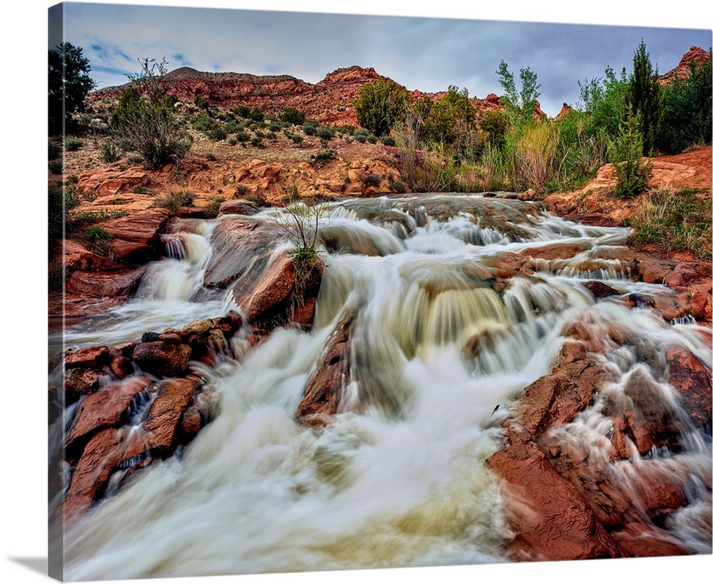 Water falling from rocks, Mill Creek, Moab, Utah, USA