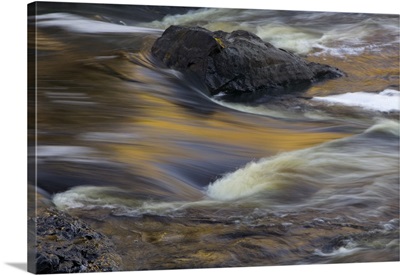 Water rushing over rocks in Saint Louis River, close up, Jay Cooke State Park, Minnesota