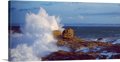 Waves crashing on rocks at wild coast, Saint-Guenole, Morbihan, Brittany, France