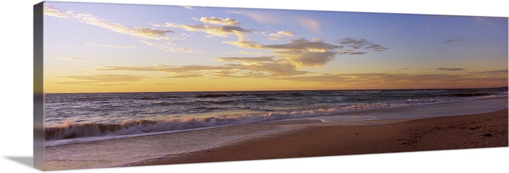 Large, horizontal wall picture of waves of the Gulf of Mexico hitting the beach in Nokomis, Florida at sunset.