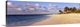 image thumbnail of Big panoramic photo of waves trickling onto the Shoal Bay Beach in Anguilla. Fooprints can be seen in the sand on the beac...