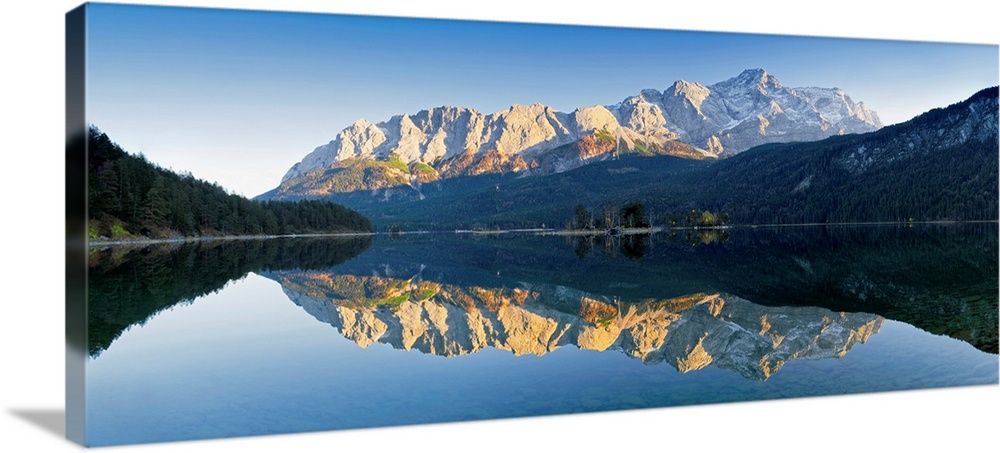 Wetterstein Mountains and Zugspitze Mountain reflecting in Lake Eibsee, Bavaria, Germany