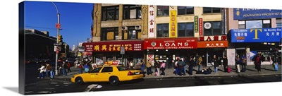 Yellow taxi on the road, Chinatown, Manhattan, New York City, New York State