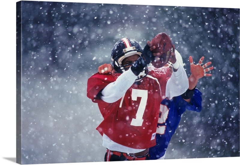 American football player reaching for the ball | Great Big Canvas