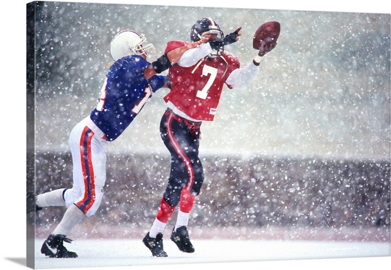 American football player reaching for the ball | Great Big Canvas