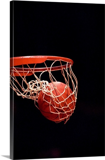 Basketball going through the hoop Photo Canvas Print | Great Big Canvas