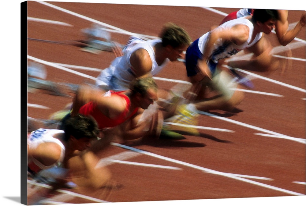 Blurred action of men's 100 meter sprint race.