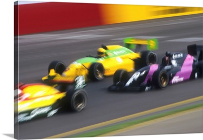 Blurred auto racing action