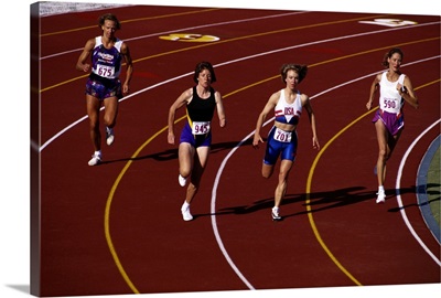 Female runners competing in a track race