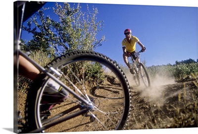 Recreational mountain biker riding on the trails