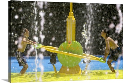Two boys playing at the water park