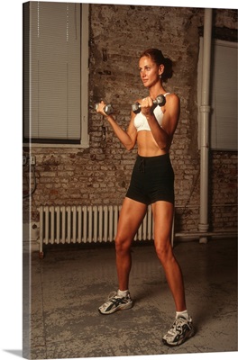 Woman working out with hand weights