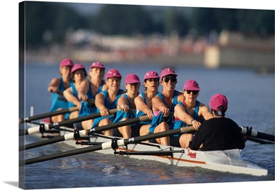 Womens eights rowing team in action