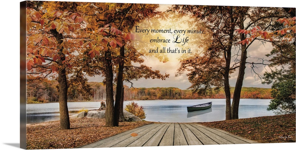 Inspirational sentiment over an image of a lake with a canoe surrounded by trees in fall colors.