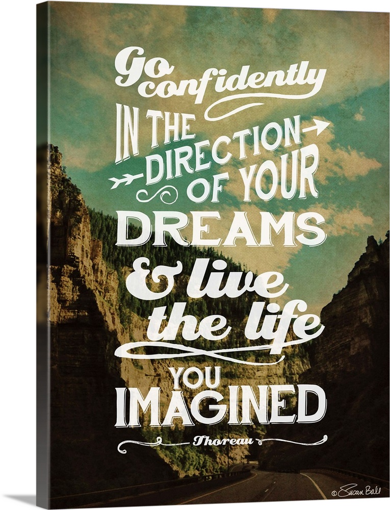 Inspirational quote in white lettering against a photograph of a mountainous valley.