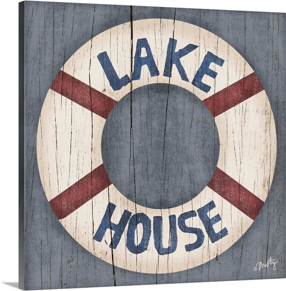 This decorative artwork of a ring buoy features the words, Lake House, over it with a cracked wood texture running through...