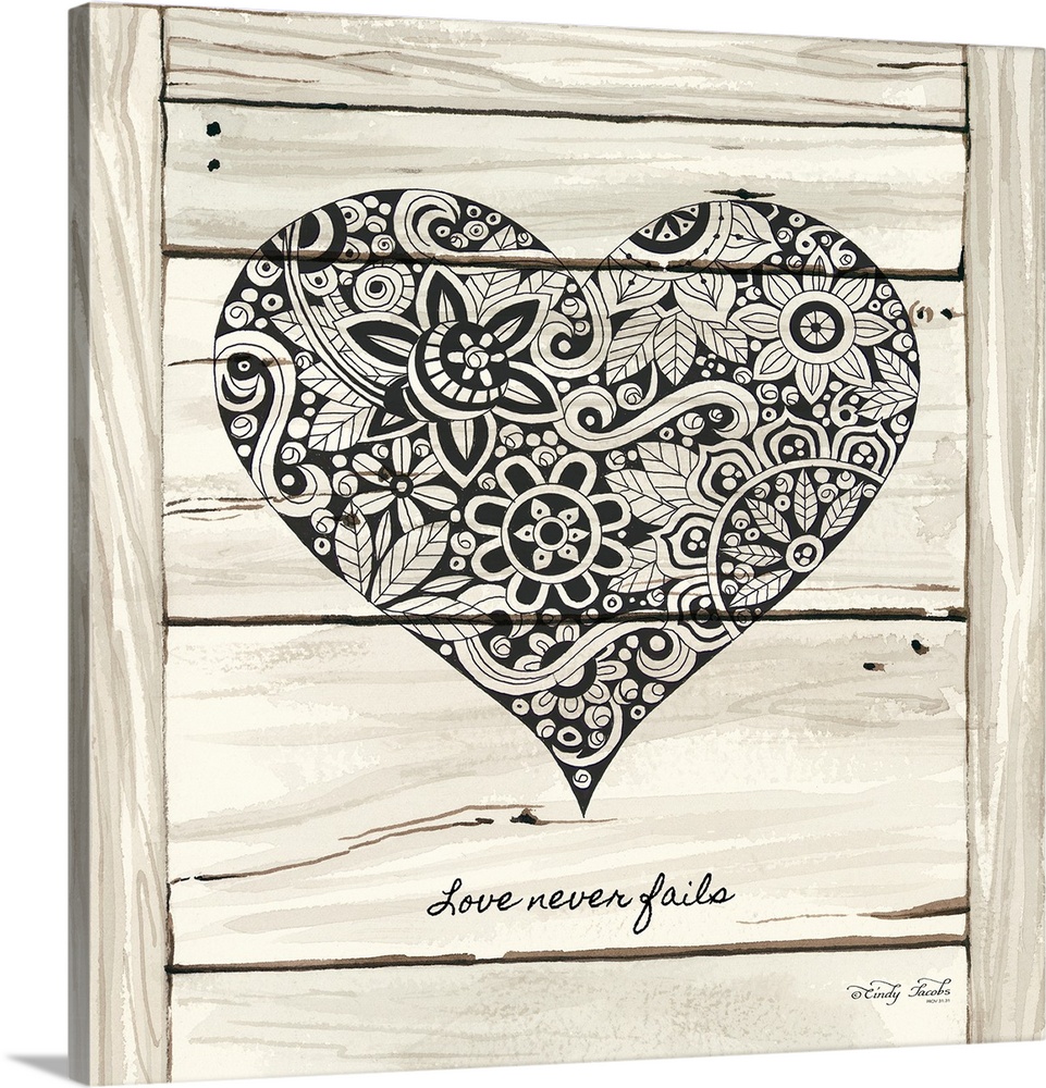 Heart with a floral lace pattern on a white wooden board background.