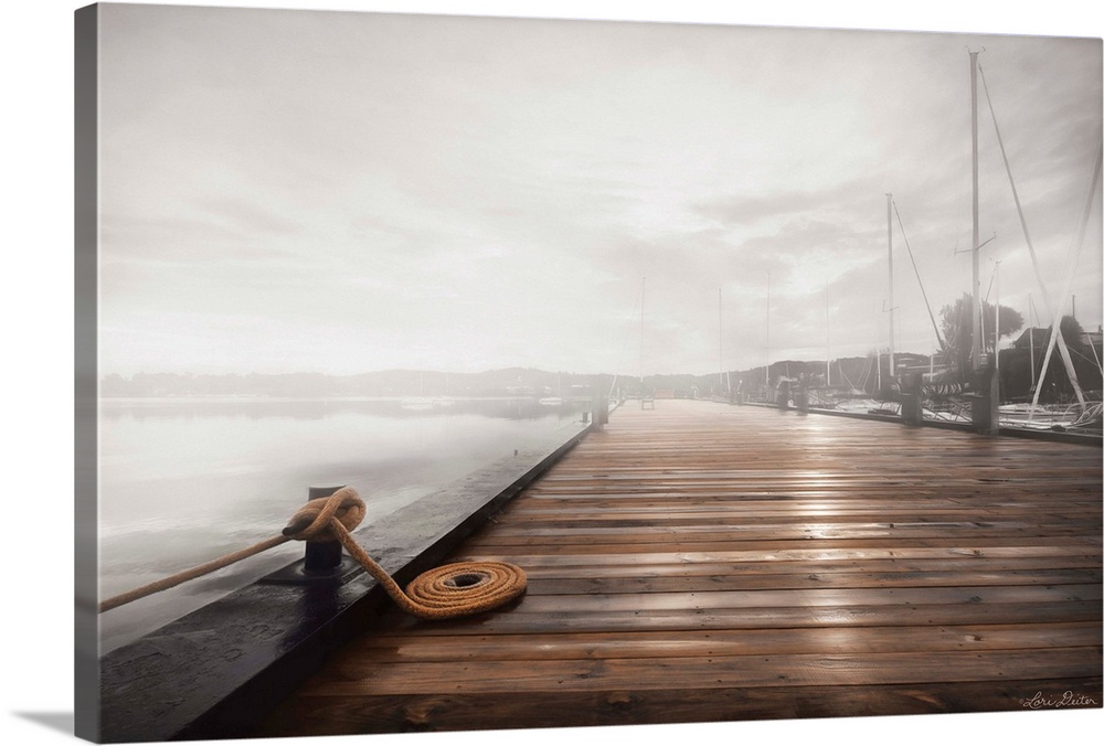 Photograph of a dock in the fog.