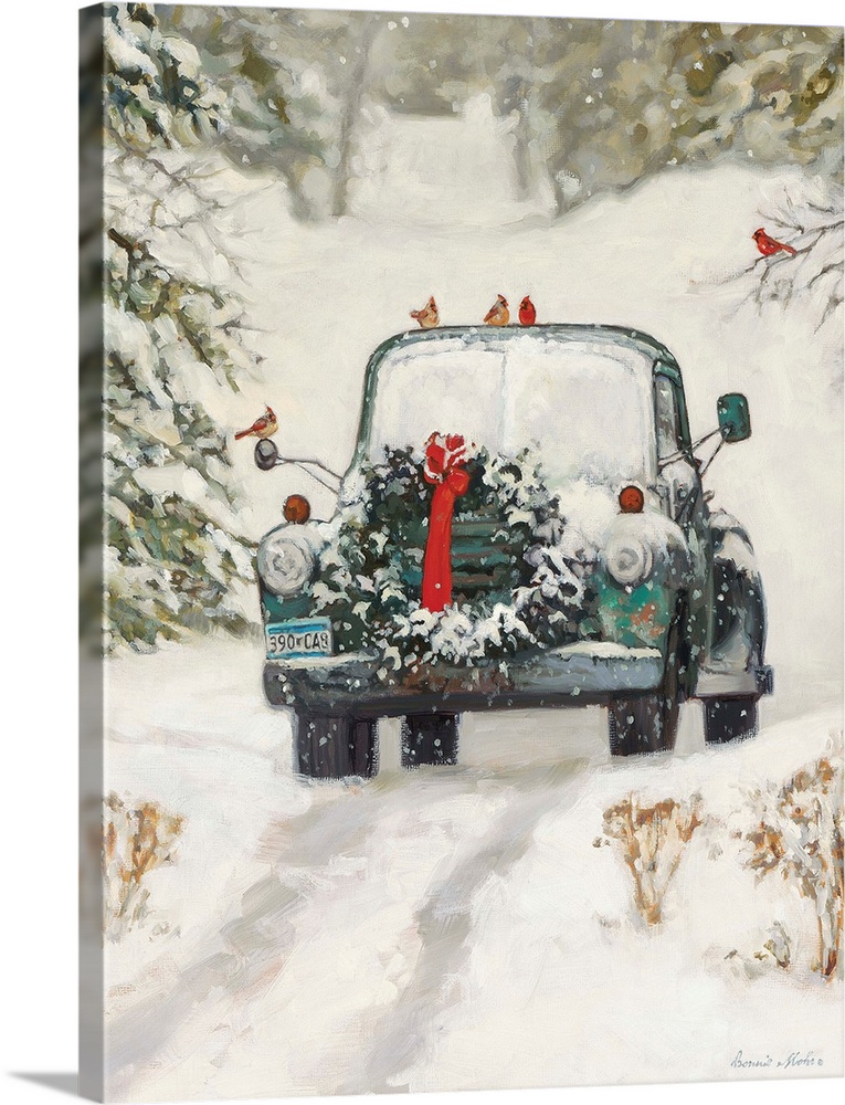 A truck with a Christmas wreath sitting in the snow in a forest.