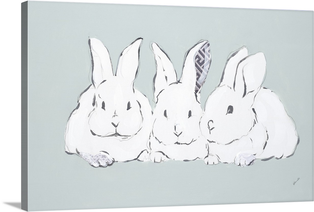 A group of three white rabbits sitting side by side.