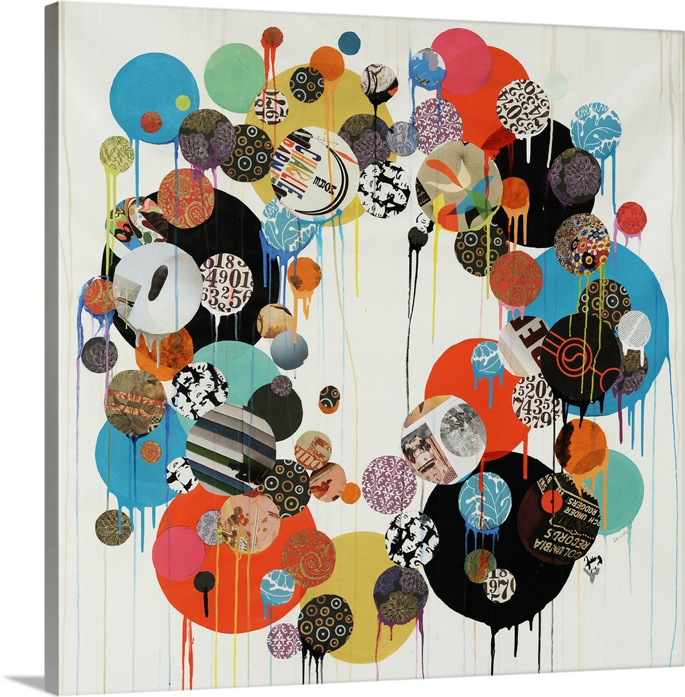 Abstract contemporary wall art featuring a collage of cut-out and painted circles put together to form a wreath-like shape...
