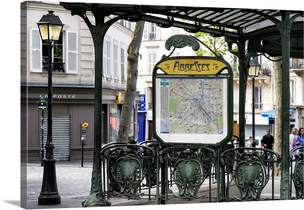 A photograph of the Abbesses subway station sign in Paris.