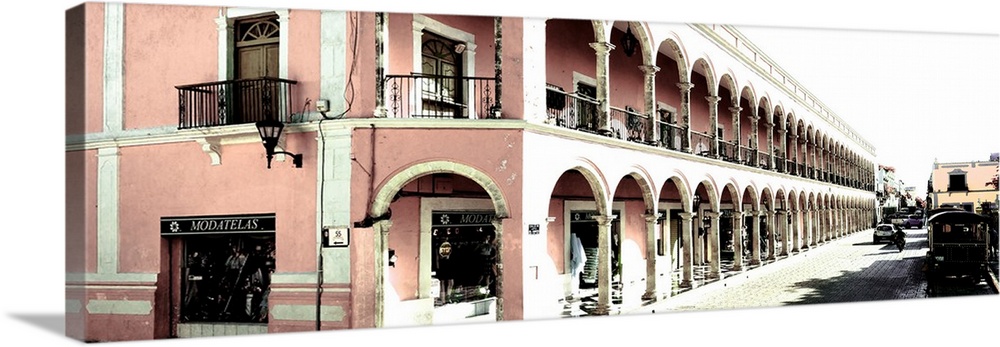 Washed out panoramic photograph of a streetscape in Campeche, Mexico, with pink architecture. From the Viva Mexico Panoram...