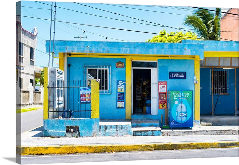 Photograph of a blue and yellow supermarket in Cancun, Mexico. From the Viva Mexico Collection.