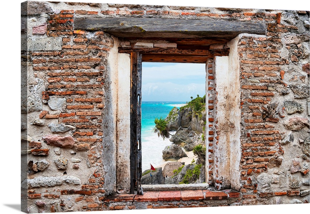 View of the Caribbean coastline in Tulum, Mexico, framed through a stony, brick window. From the Viva Mexico Window View.