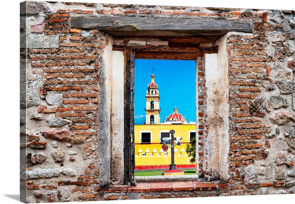 View of a Courtyard of a Church in Puebla, Mexico, framed through a stony, brick window. From the Viva Mexico Window View.