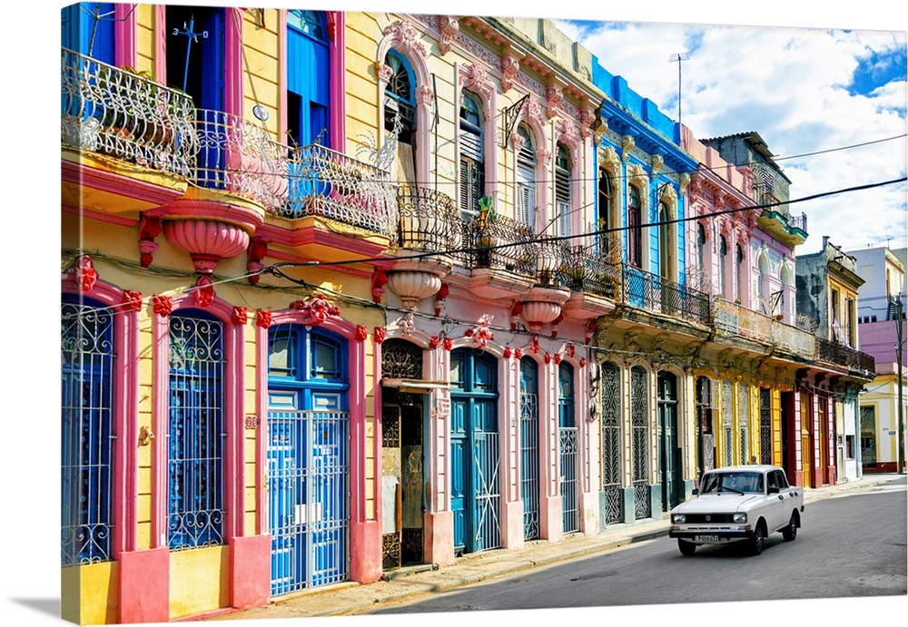 Colorful Havana Facades with a car passing by