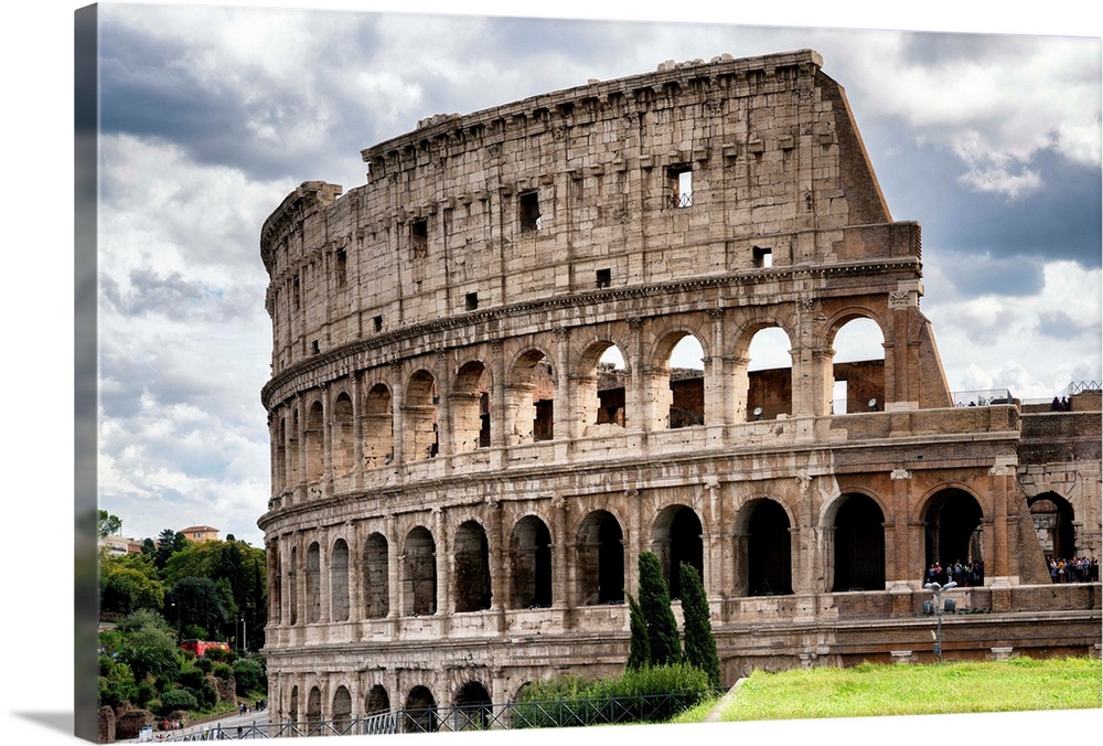 It's a view of the Colosseum in the centre of the city of Rome, Italy.