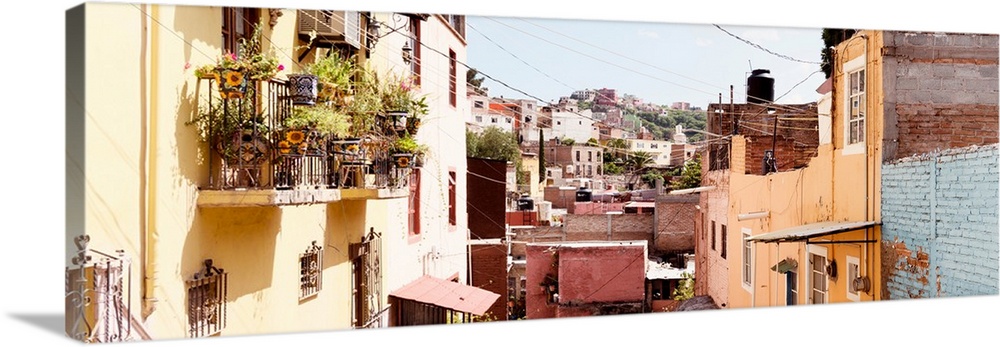 Panoramic photograph of rows of colorful houses in Guanajuato, Mexico. From the Viva Mexico Panoramic Collection.