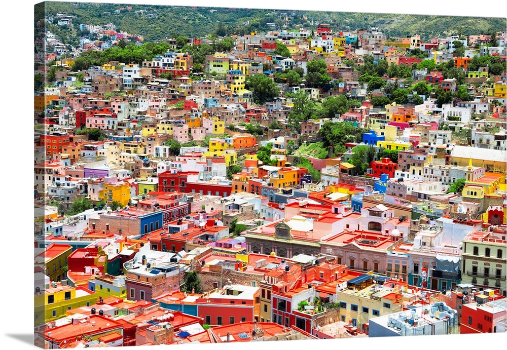 Aerial photograph of the city of Guanajuato, Mexico, with colorful buildings. From the Viva Mexico Collection.