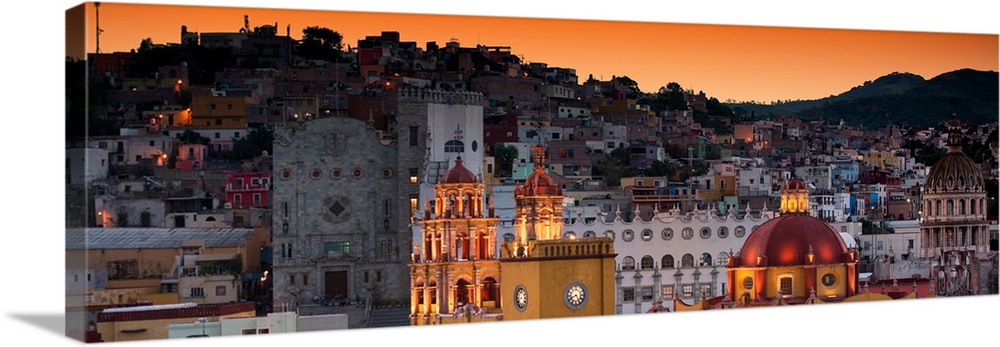 Panoramic photograph of the iconic Yellow Church at night in Guanajuato, Mexico. From the Viva
