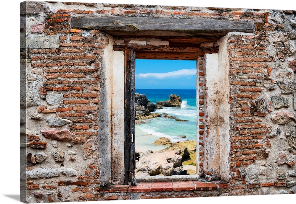 View of the Isla Mujeres coastline framed through a stony, brick window. From the Viva Mexico Window View.