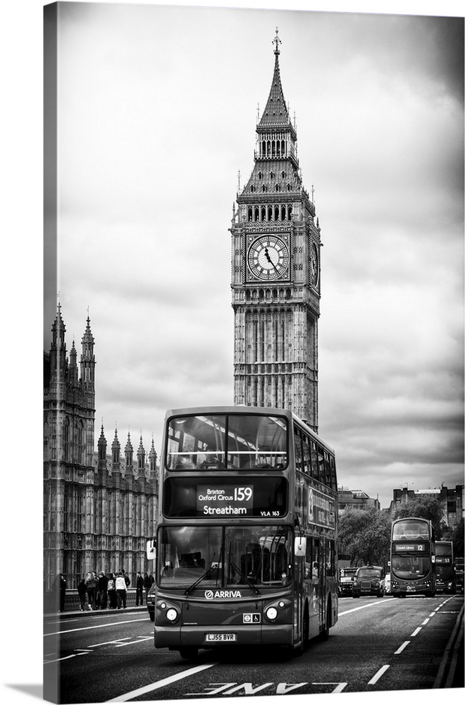 Photograph of the iconic double decker bus driving past Big Ben in London.