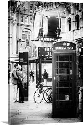 Loving Couple Kissing and Red Telephone Booth, London