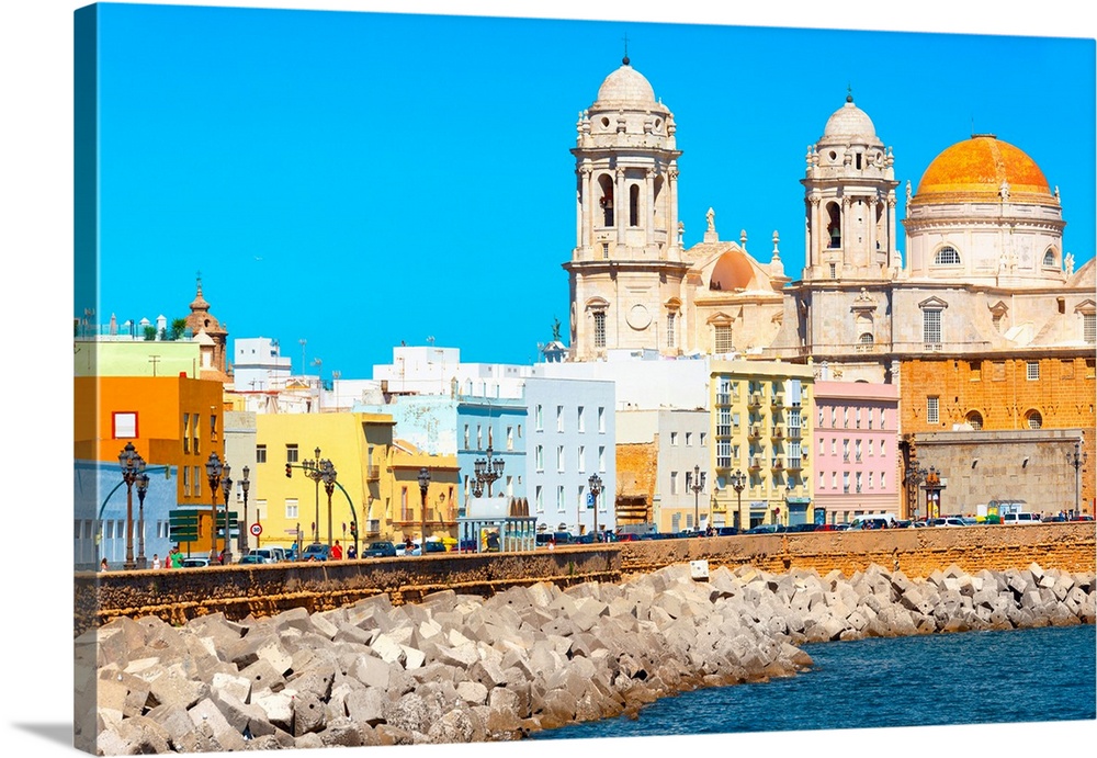 It's the seaside on the city of Cadiz in Spain, with its colorful architecture.
