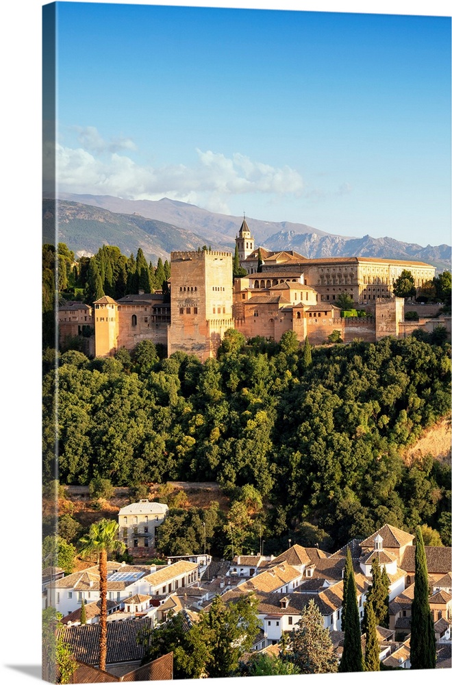 It's a magnificent view of the Alhambra at sunset in Granada, Spain.