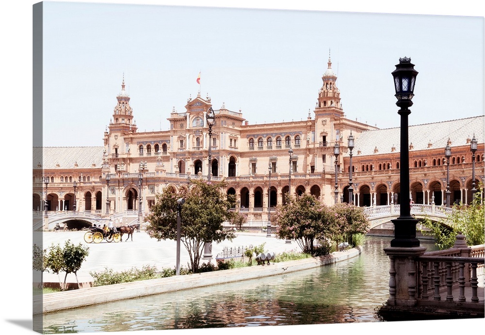 It's the beautiful Plaza de Espana (Spain Square) with the Palace and the bridge on the canal in Seville.