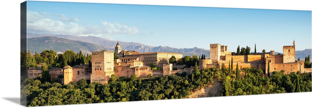 It's a beautiful view of the Alhambra at sunset in Granada, Spain.