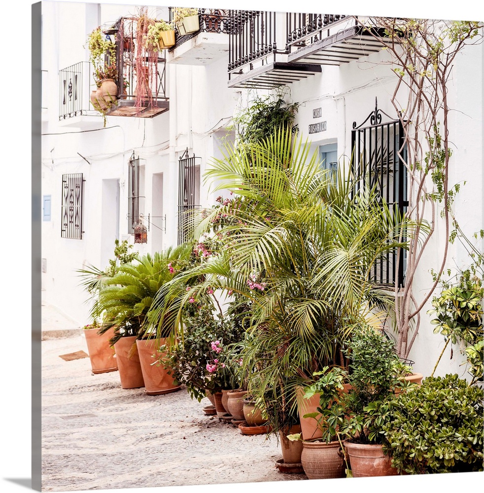 It's a street with white facades in the city of Mijas (Malaga) in Andalusia, Spain.