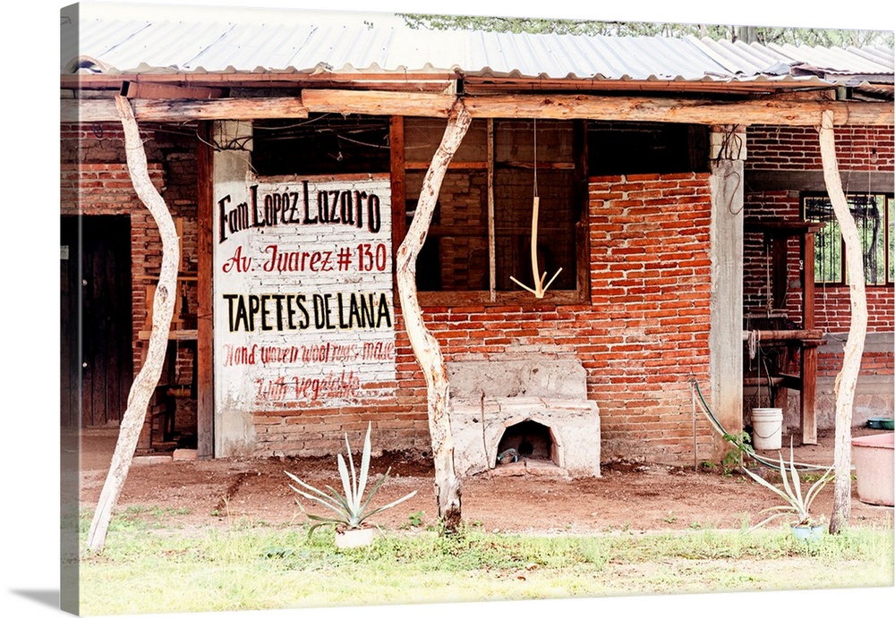 Photograph of a building where woven wool rugs (tapetes de lana) are made. From the Viva Mexico Collection.